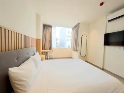 Phòng Deluxe Queen — Wander Lane Hotel & Coliving